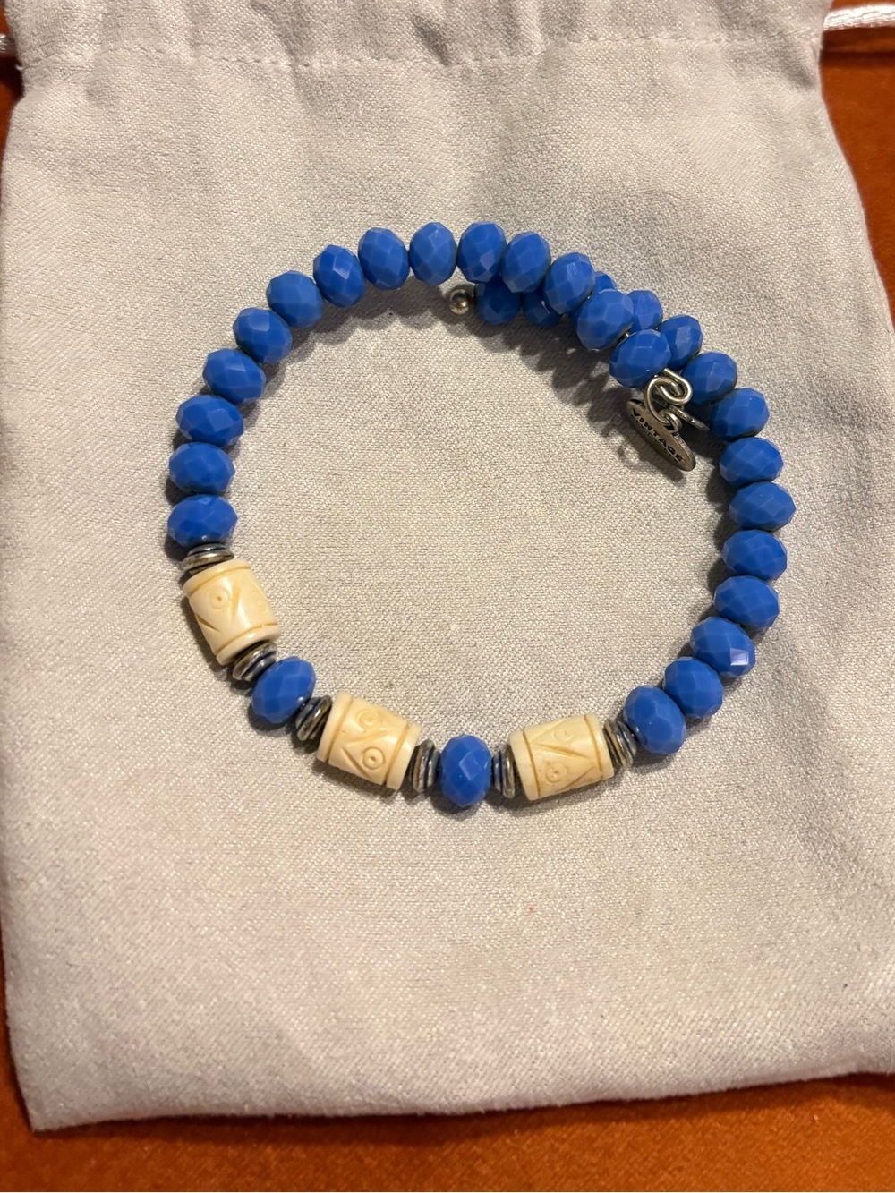 Alex and Ani Cobalt Blue Bead Bracelet with Cream Carved Accents
